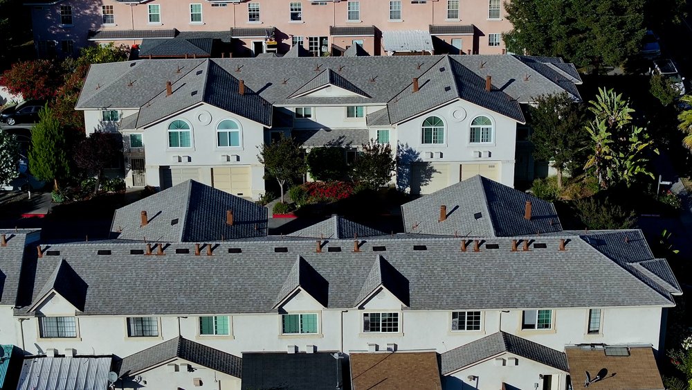 Slide of Symplify Roofing