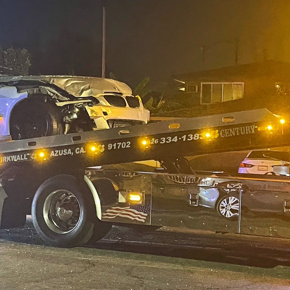 The Accident Guys - Car on tow truck - Personal Injury Law Near Me - Corona, California The Accident Guys - Car on tow truck - Personal Injury Law Near Me - Corona, California