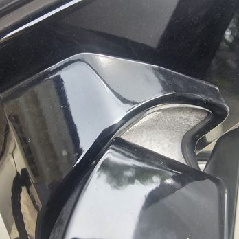 Pride Auto Repair - The side view mirror with concrete in the place where the black cover should be, not mine. - Auto Repair Near Me - Warren, Michigan Pride Auto Repair - The side view mirror with concrete in the place where the black cover should be, not mine. - Auto Repair Near Me - Warren, Michigan
