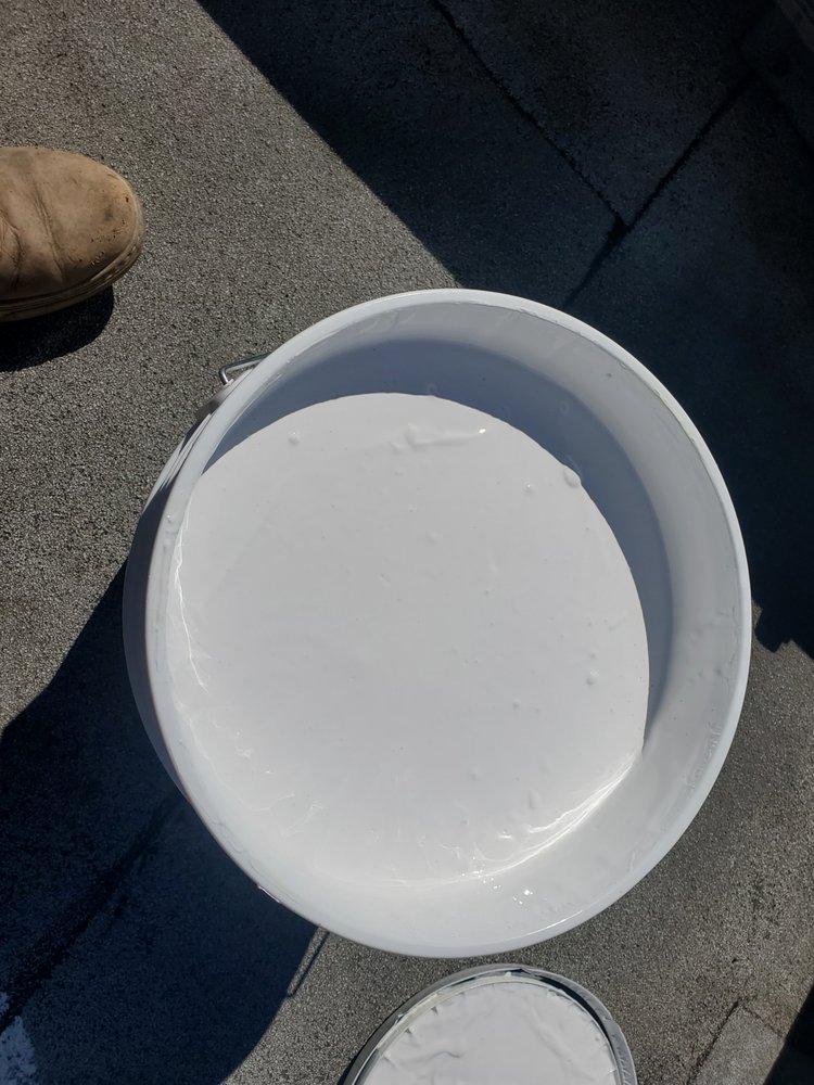 Slide of Mikes Roofing