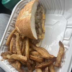 Grill Master BBQ - The Steak Sandwich loaded with onions and the cheese but no steak in sight.