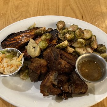 Blue Collar - Griot (crispy pork shoulder) with pikliz and gravy, Caramelized Brussels Sprouts, sweet potato with Chile brown butter - Comfort Food Near Me - Miami, Florida