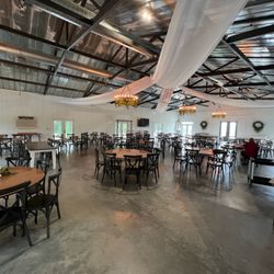 Winter Wood Farm - Inside the venue. Table and chair layout is 100% customized to your event and guest count, and you choose how you want it laid out.