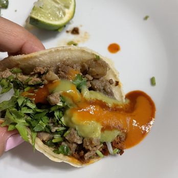 Blady’s Tacos - Taco with all the sauces. Spicy was a bit spicy. - Mexican Near Me - Huntington Beach, California Blady’s Tacos - Taco with all the sauces. Spicy was a bit spicy. - Mexican Near Me - Huntington Beach, California