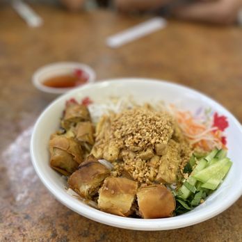 Pho 99 - a bowl of food on a table - Vietnamese Near Me - Hilo, Hawaii Pho 99 - a bowl of food on a table - Vietnamese Near Me - Hilo, Hawaii