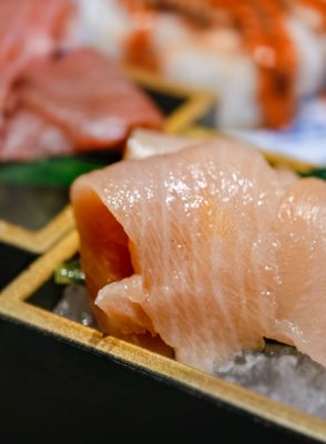 Kura Revolving Sushi Bar by null