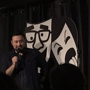 Rob's Comedy Playhouse - a man speaking into a microphone - Comedy Clubs Near Me - Kenmore, New York Rob's Comedy Playhouse - a man speaking into a microphone - Comedy Clubs Near Me - Kenmore, New York