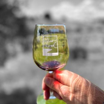 Bent Creek Winery - a hand holding a wine glass - Wineries Near Me - Livermore, California Bent Creek Winery - a hand holding a wine glass - Wineries Near Me - Livermore, California