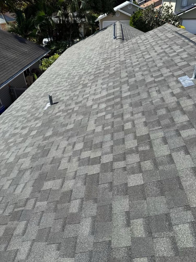 Slide of New Era Roofing