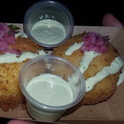 PAPA LLAMA - Enjoying a couple of delicious Papas Rellenas (1 carne, 1 queso). Amazing!!!!