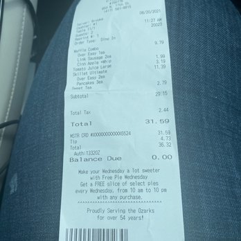 Village Inn - a receipt on the seat of a car - New American Near Me - Ozark, Missouri Village Inn - a receipt on the seat of a car - New American Near Me - Ozark, Missouri