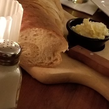 Austin's Wood Fire Grille - Warm bread loaf - American Near Me - Brecksville, Ohio Austin's Wood Fire Grille - Warm bread loaf - American Near Me - Brecksville, Ohio