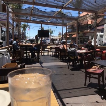 PizMo Cafe - The outside patio seats - Pizza Near Me - Pismo Beach, California PizMo Cafe - The outside patio seats - Pizza Near Me - Pismo Beach, California