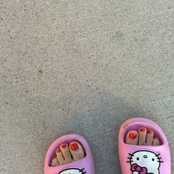 Hello kitty feet. Fresh pedicure.