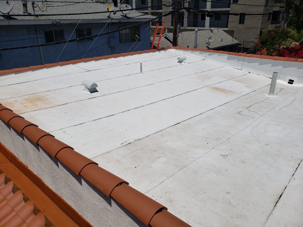 Slide of Trujano Roofing