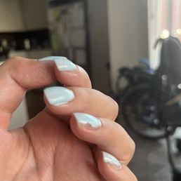 My nails after a so called gel manicure.  Horrible job.