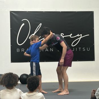 Odyssey JiuJitsu - Coach Campbell is an amazing instructor!! Builds the kids confidence and teaches them solid techniques. - Brazilian Jiu-jitsu Near Me - Atlanta, Georgia Odyssey JiuJitsu - Coach Campbell is an amazing instructor!! Builds the kids confidence and teaches them solid techniques. - Brazilian Jiu-jitsu Near Me - Atlanta, Georgia