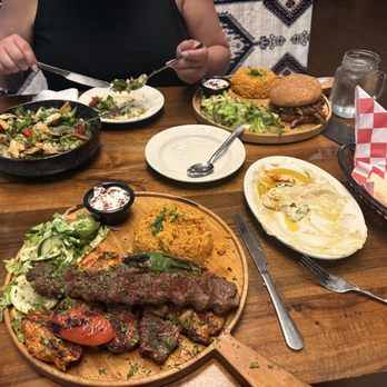 Kanoon - Mixed Grill Tabbouleh Salad Fresh Mint Lemonade Hummus Plate Kanoon Smoked Brisket Burger - Steakhouses Near Me - Fishers, Indiana Kanoon - Mixed Grill Tabbouleh Salad Fresh Mint Lemonade Hummus Plate Kanoon Smoked Brisket Burger - Steakhouses Near Me - Fishers, Indiana