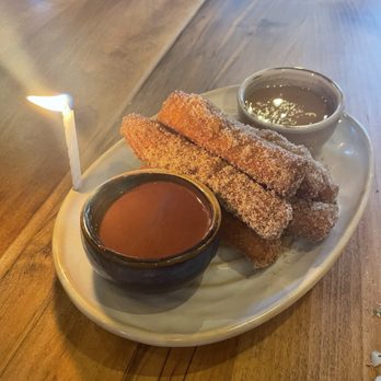 Puerta - Churros! With a birthday candle - Mexican Near Me - Charlotte, North Carolina Puerta - Churros! With a birthday candle - Mexican Near Me - Charlotte, North Carolina