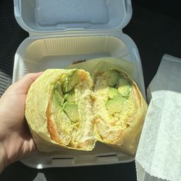Egg cheese avocado croissant sandwich