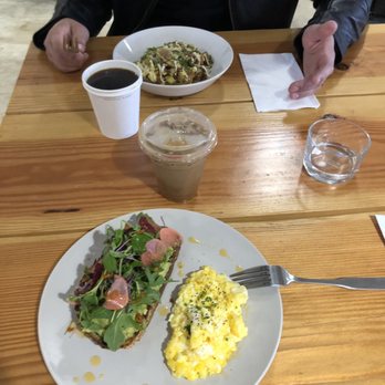 Arcade Coffee Roasters - Potato thing and the avocado toast. I got mocha latte almond milk and he got a black coffee. - Coffee & Tea Near Me - Riverside, California