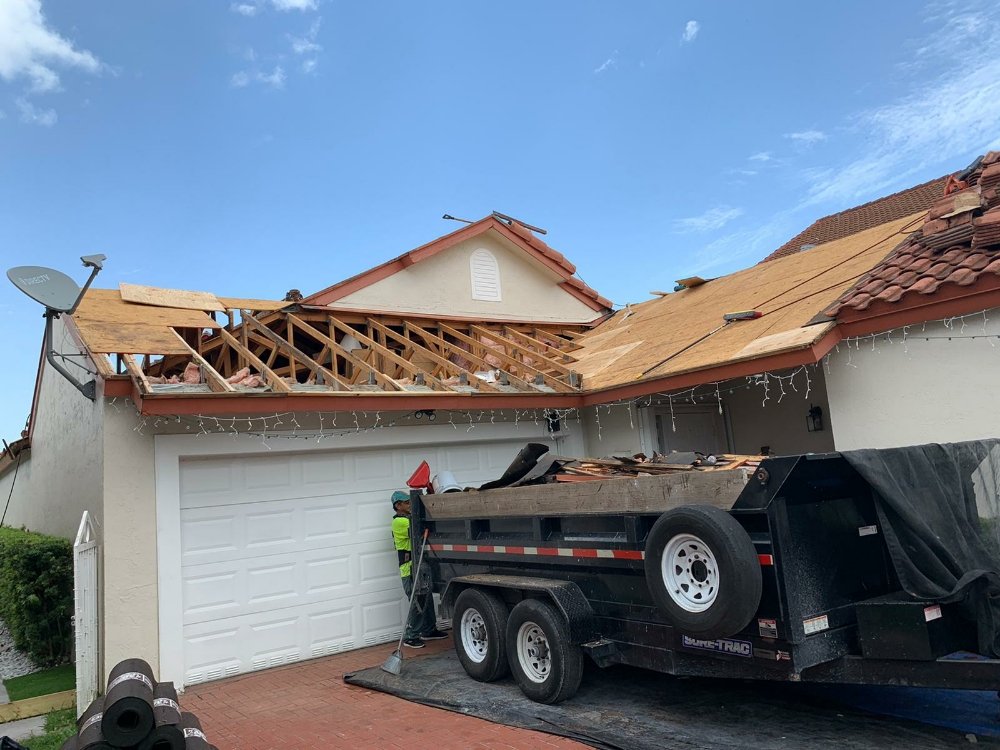 Slide of UnderCover Roofing & Metal