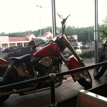 McDonald's - a red motorcycle parked in front of a window - Coffee & Tea Near Me - Cumming, Georgia McDonald's - a red motorcycle parked in front of a window - Coffee & Tea Near Me - Cumming, Georgia