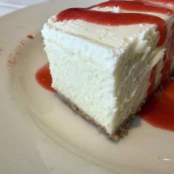 Las Brisas - Cheesecake with raspberry sauce - Mexican Near Me - Laguna Beach, California Las Brisas - Cheesecake with raspberry sauce - Mexican Near Me - Laguna Beach, California