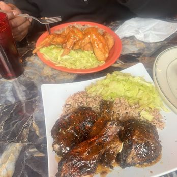 Flavor Caribbean Cuisine - Jerk Chicken w/rice & beans, cabbage, and festive. Hot honey whole wings, cabbage, rice&bean. - Caribbean Near Me - Frankenmuth, Michigan Flavor Caribbean Cuisine - Jerk Chicken w/rice & beans, cabbage, and festive. Hot honey whole wings, cabbage, rice&bean. - Caribbean Near Me - Frankenmuth, Michigan