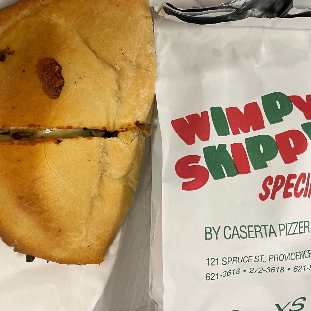 Caserta Pizzeria - Wimpy Skimpy spinach, cheese, pepperoni and olives spinach pie. - Pizza Near Me - Providence, Rhode Island