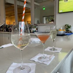 Hugo spritz, paper plane, and Prosecco