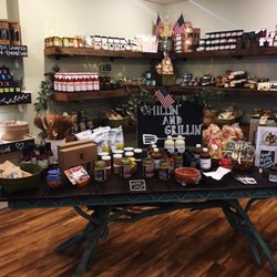 Seasons Olive Oil and Vinegar Taproom - Seasonal display in the back. Summer means grilling display!