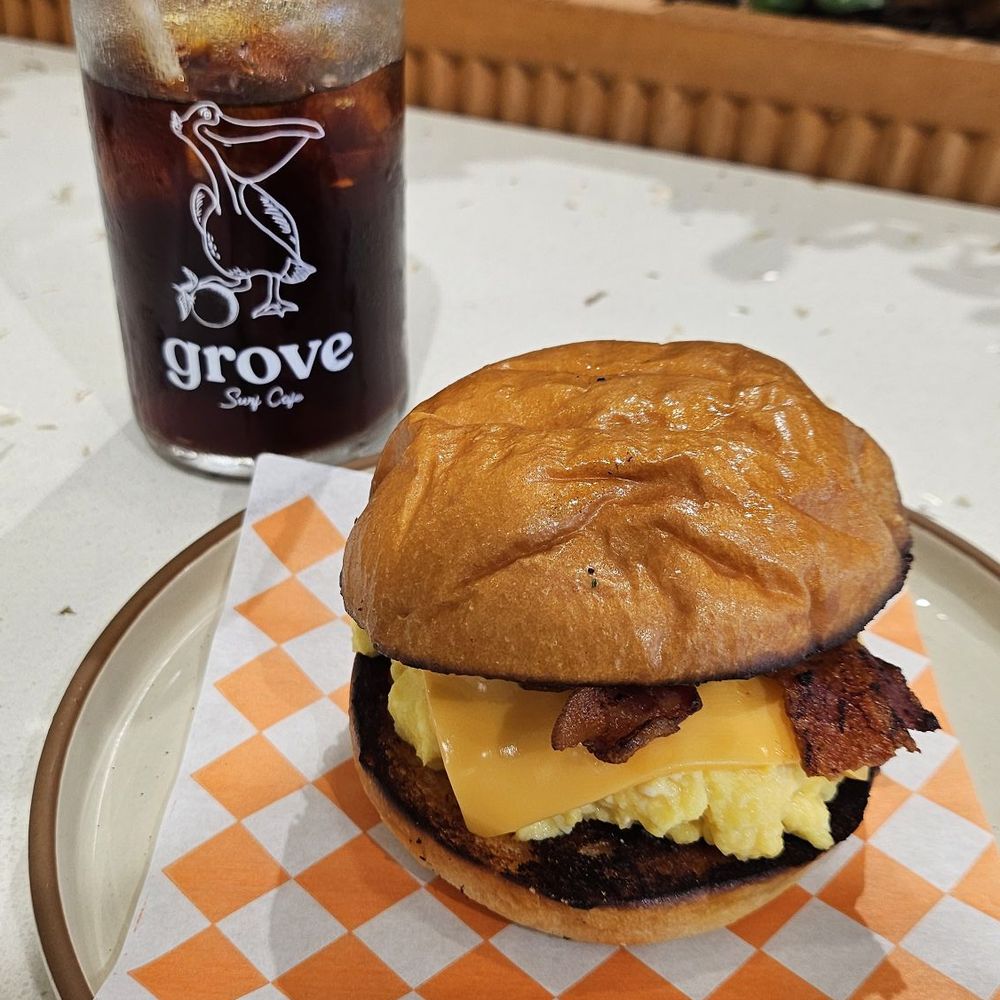 Grove Surf Cafe - Bacon, Egg and Cheese with Cold Brew Coffee. - Coffee & Tea Near Me - Indian Rocks Beach, Florida Grove Surf Cafe - Bacon, Egg and Cheese with Cold Brew Coffee. - Coffee & Tea Near Me - Indian Rocks Beach, Florida