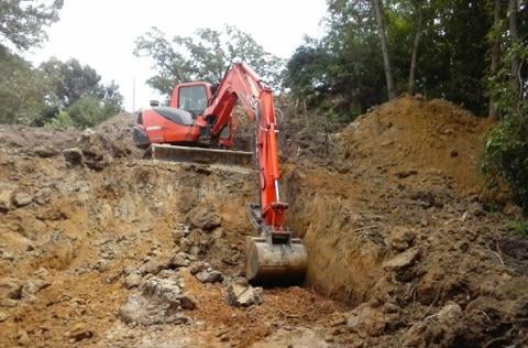 Slide of Roach and Family Septic Excavating & Drain Cleaning