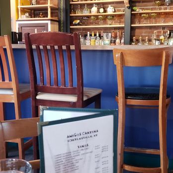 Amigos Cantina - Miss matched chairs everywhere. - Mexican Near Me - Schuylerville, New York