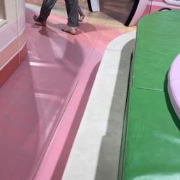 Parent and kid without "grip socks" meanwhile they charged my kids for "grip socks"