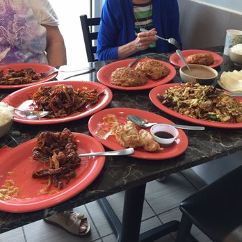 Hunan Cafe - Oops! Finally remembered to take picture to show what's left of the egg rolls and dumplings. L to R crispy beef, egg foo young, beef mu shu. - Chinese Near Me - Manassas, Virginia