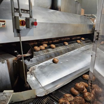 Rockland Bakery - a conveyor belt with doughnuts on it - Bakeries Near Me - Nanuet, New York Rockland Bakery - a conveyor belt with doughnuts on it - Bakeries Near Me - Nanuet, New York