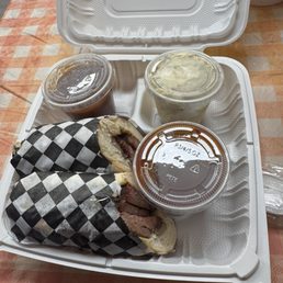 Brisket Sandwich with potato salad & bbq beans. Good portions, and filling.