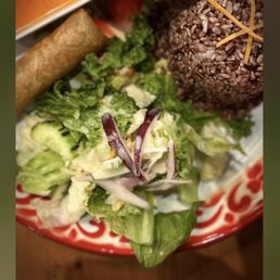 Terrific yellow curry, and vegetables, salad, & egg roll all inclusive