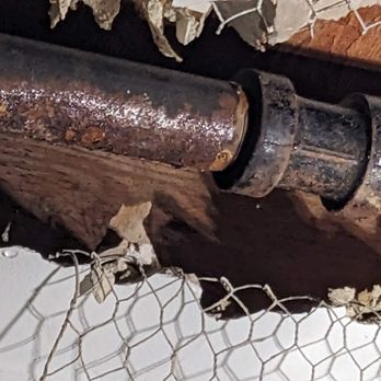 Michael Slayton General Contracting - a rusted pipe in a house - General Contractors Near Me