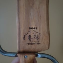 Fong's Wing Chun Gung Fu Federation - A training Baat Cham Do, Butterfly Knife. Hand made by their Sifu with their emblem on it.