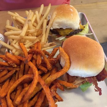 CHOM Burger - Yummy chicken sandwich with sweet potato fries. Hubby had a CHOM burger with regular fries. - Burgers Near Me - Provo, Utah