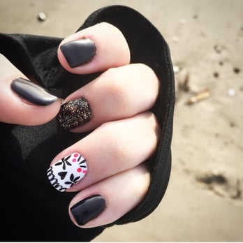 Nail Works - Day of the Dead calaca design on white with gold glitter on black by Lina. - Nail Salons Near Me - Oxnard, California