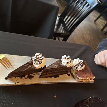 Blackstone Putnam - Dessert flight if two chocolate mousse cakes and a tiramisu. - Seafood Near Me - Putnam, Connecticut Blackstone Putnam - Dessert flight if two chocolate mousse cakes and a tiramisu. - Seafood Near Me - Putnam, Connecticut