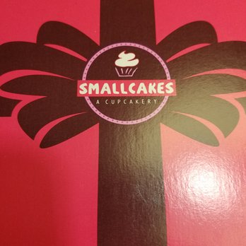 Smallcakes A Cupcakery - Small Cakes signature logo and packaging. - Cupcakes Near Me - Stillwater, Oklahoma Smallcakes A Cupcakery - Small Cakes signature logo and packaging. - Cupcakes Near Me - Stillwater, Oklahoma