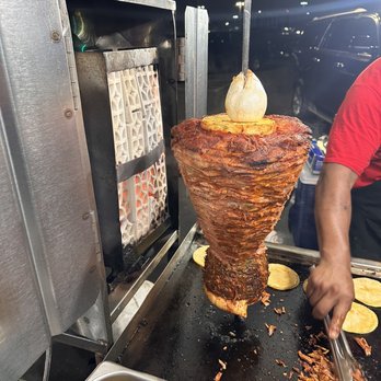 Tacos El Charro - a man preparing food - Tacos Near Me - Los Angeles, California