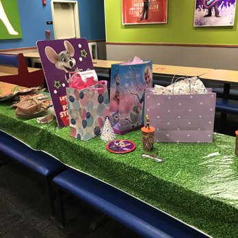 Chuck E. Cheese - a table set up for a children's birthday party - Pizza Near Me - Jacksonville, Florida