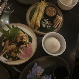 Papaya salad with prawns, chicken skewers and turnip crepes, jasmine rice
