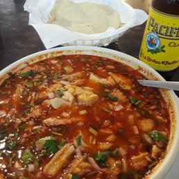 Menudo.  I add a bunch of heat and fixin's from their salsa bar.  $9.99 deal $2 beer